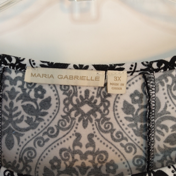 MARIA GABRIELLE SLEEVELESS BOTTOM FLARED TOP BLACK WHITE - Picture 2 of 9